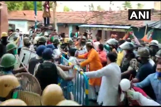 TMC and BJP workers clashed at a rally organised by the latter in North 24-Parganas in West Bengal. (Credit: ANI/Twitter)