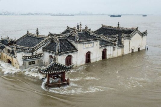 700-year-old Guanyinge temple,  built on an rocky island in the Yangtze River, in Wuhan, China.
(Image credit: Twitter/AFP)