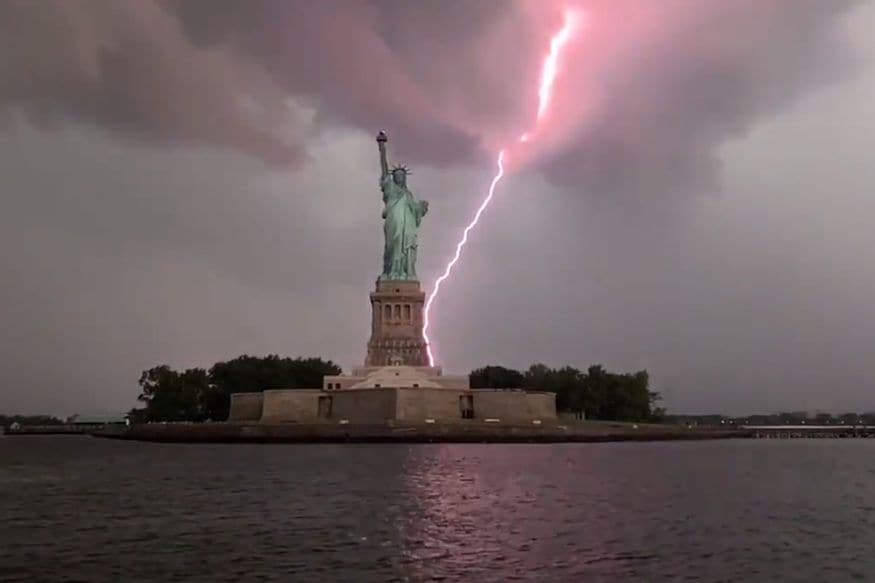 Man Captures Exact Moment When Lightning Strikes Statue of Liberty amid ...