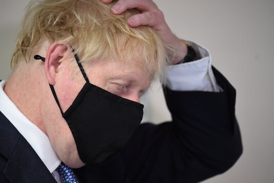 Britain's Prime Minister Boris Johnson visits the Tollgate Medical Centre in Beckton, London, Britain July 24, 2020. Jeremy Selwyn/Pool via REUTERS