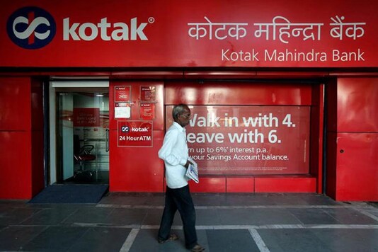 For representation: A man walks past the Kotak Mahindra Bank branch in New Delhi. (Reuters)