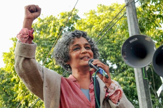 File photo of author Arundhati Roy addressing a gathering, during a protest against the Citizenship Amendment Act (CAA), outside the Jamia Millia Islamia University in New Delhi in Jan 2020. (PTI Photo)