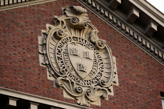 A seal hangs over a building at Harvard University in Cambridge, Massachusetts November 16, 2012. REUTERS/Jessica Rinaldi 
