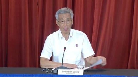 Singapore PM flags retirement delay over virus as he unveils cabinet