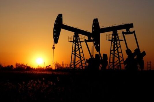 Oil down nearly 4% as virus surge weighs on demand outlook