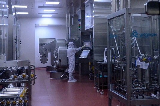 A research scientist works inside a laboratory of India's Serum Institute, the world's largest maker of vaccines, which is working on vaccines against the coronavirus disease (COVID-19) in Pune. (Reuters)