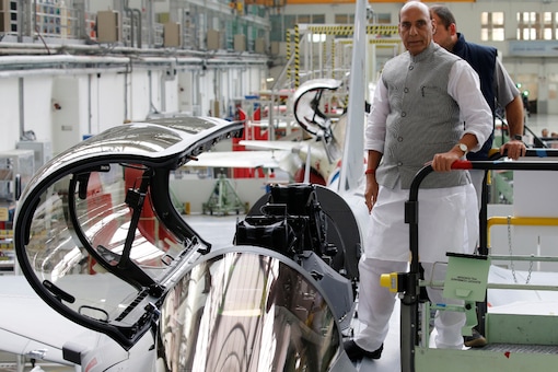 In this October 8, 2019 file photo, defence minister Rajnath Singh visits the assembly line for Indian Air Force Rafale fighter jets before a ceremony at the factory of French aircraft manufacturer Dassault Aviation in Merignac near Bordeaux, France. (REUTERS/Regis Duvignau)