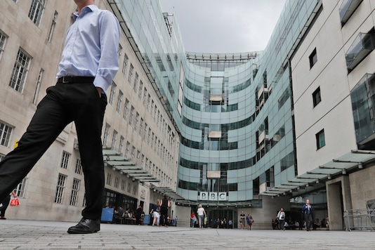 FILE - This Wednesday, July 19, 2017 file photo shows the main entrance to the headquarters of the publicly funded BBC in London. British radio host Sideman quit the BBC on Saturday Aug. 8, 2020, over the corporation’s decision to include a racial slur in a news report about a racist attack. (AP Photo/Frank Augstein, File)