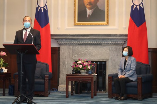 U.S. Secretary of Health and Human Services Alex Azar wearing a face mask attends a meeting with Taiwan President Tsai Ing-wen at the presidential office, in Taipei, Taiwan August 10, 2020. Central News Agency/Pool via REUTERS