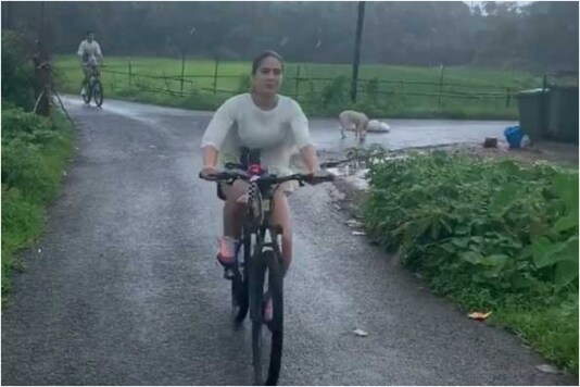 Sara Ali Khan Enjoys Monsoon as She Cycles with Brother Ibrahim on a Rainy Day