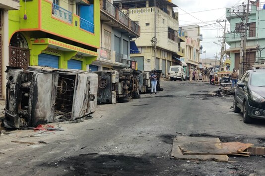 File photo: The damaged vehicles in Bengaluru during violence. 