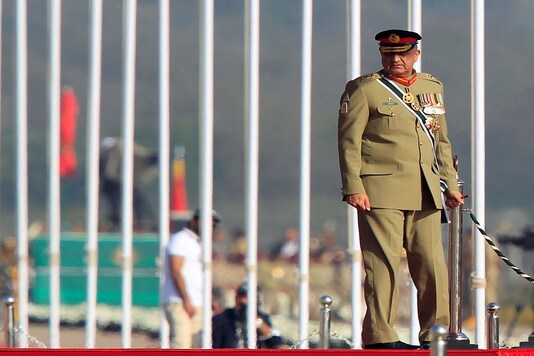 FILE PHOTO: Pakistan's Army Chief of Staff  General Qamar Javed Bajwa arrives to attend the Pakistan Day military parade in Islamabad, Pakistan, March 23, 2017. REUTERS/Faisal Mahmood/File Photo