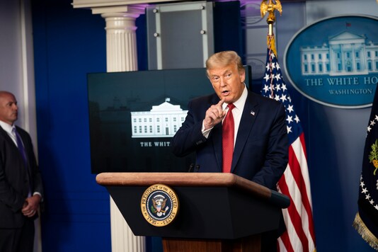 US President Donald Trump speaks to reporters at the White House on August 10, 2020. (Doug Mills/The New York Times) 