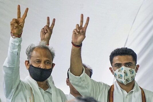 Rajasthan CM Ashok Gehlot and Sachin Pilot flash victory signs after the truce on Thursday. (PTI)