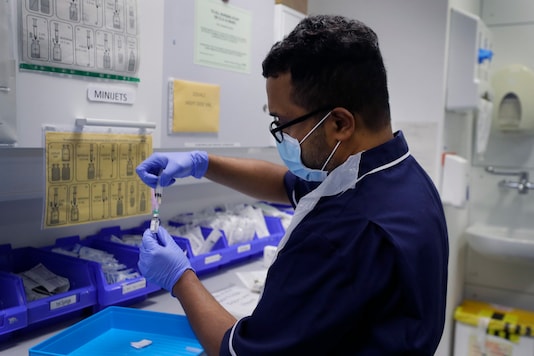 A nurse prepares the Covid-19 vaccine to administer to a volunteer, at a clinic in London, on August 5, 2020. (Representative/AP Photo/Kirsty Wigglesworth)