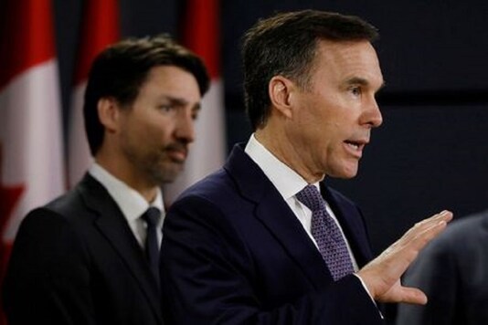 Canada's Minister of Finance Bill Morneau attends a news conference with Prime Minister Justin Trudeau in Ottawa, Ontario, Canada. (Reuters)