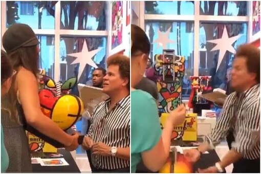 Screenshot of video showing the restaurant owner yelling at the artist and breaking his artwork.