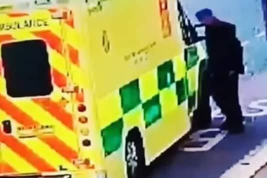 Man tries to steal ambulance as medics treat patient inside. Credit: YouTube Man tries to steal ambulance as medics treat patient inside. Credit: YouTube