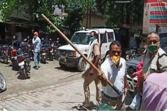 Bilthara Road SDM Ashok Chaudhary suspended for beating people not wearing masks. (Screengarb from viral video)