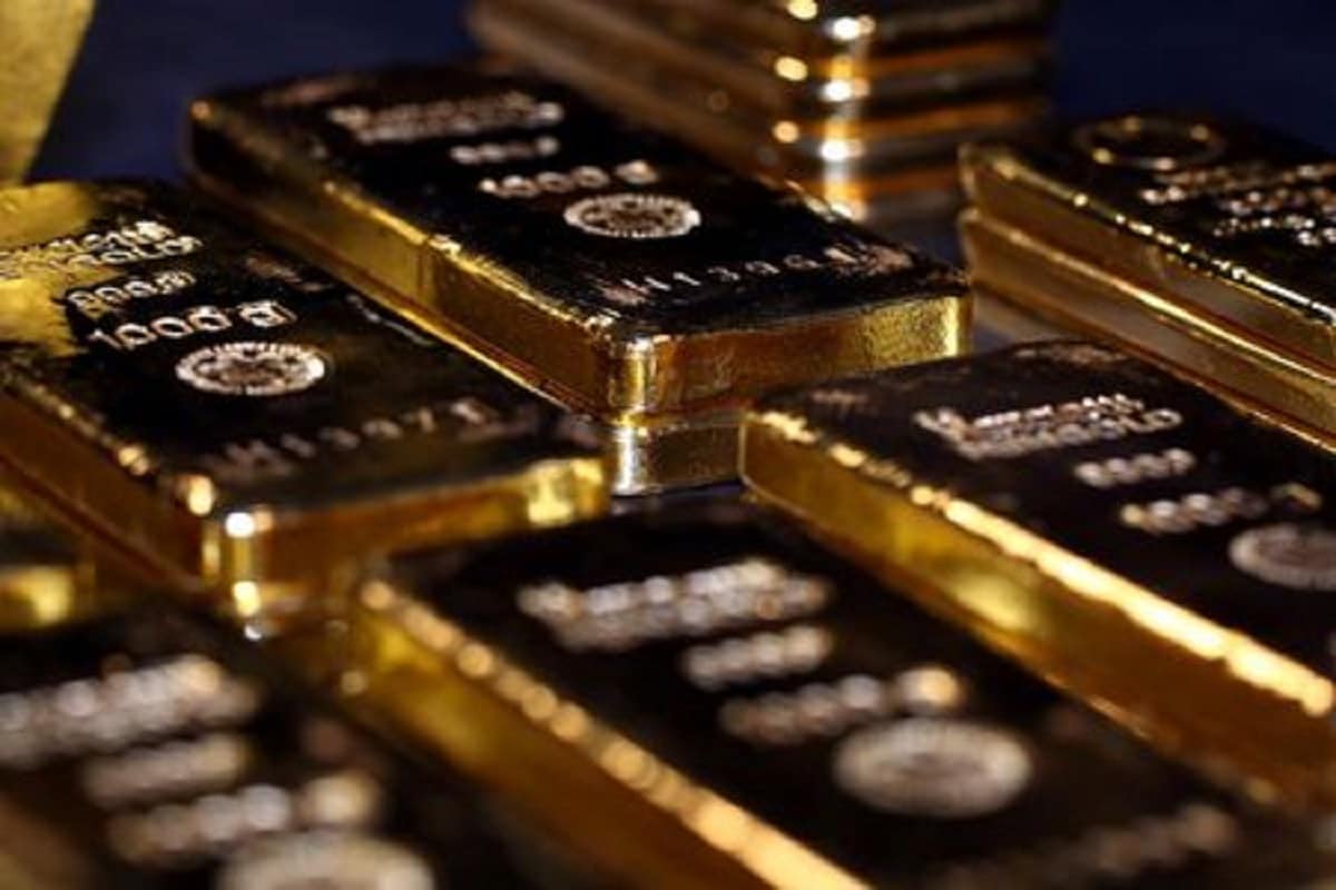 Gold Hits Near Two-week High On Weaker Dollar, Dovish Fed Signals