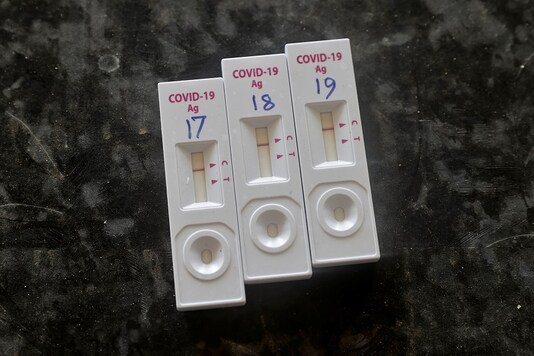 Used coronavirus testing kits are left on a table at a testing and isolation ward for suspected COVID-19 patients at the primary health centre in Ismailpur, during the coronavirus disease (COVID-19) outbreak, in Bhagalpur, Bihar. (Image: Reuters)