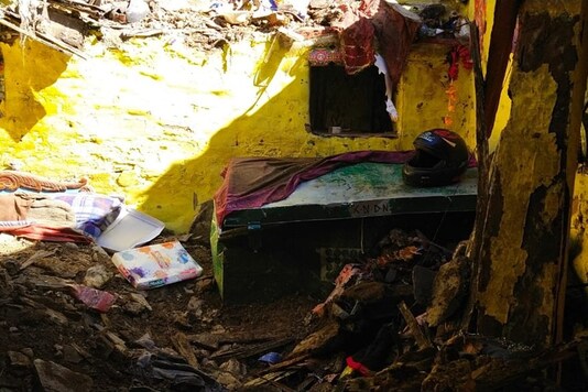SDRF and police personnel have extricated the bodies from the rubble of the house and rescued Nath's wife. (Image: Twitter/ANI)