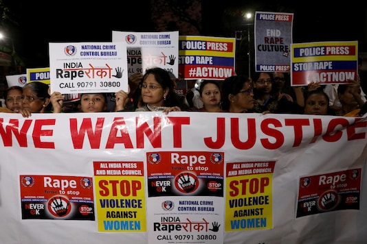 Women display a banner and placards as they attend a protest march against rising incidents of rape. (Representational Image: Reuters)