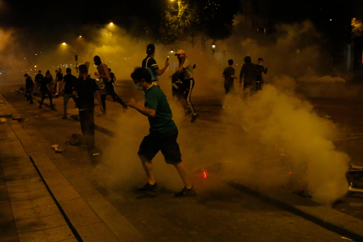 UEFA Champions League: PSG Fans Clash with Paris Riot Police after ...