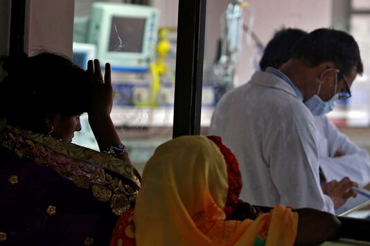 A woman looks into the intensive care unit (ICU) at the Baba Raghav Das hospital in the Gorakhpur district. (Reuters)