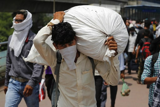 Migrant workers return to the cities after the coronavirus lockdown was relaxed. (AP File)