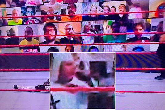 A fan wearing KKK costume during WWE RAW   (Photo Credit: Twitter)