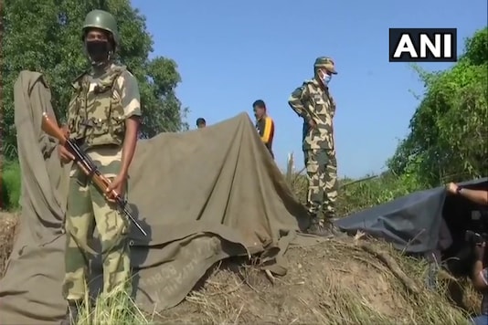 Security forces deployed at the site where a tunnel was found in Samba. (Twitter/ANI)
