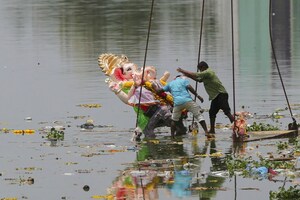 Devotees Bid Adieu to Ganpati Bappa in a Low-Key Manner