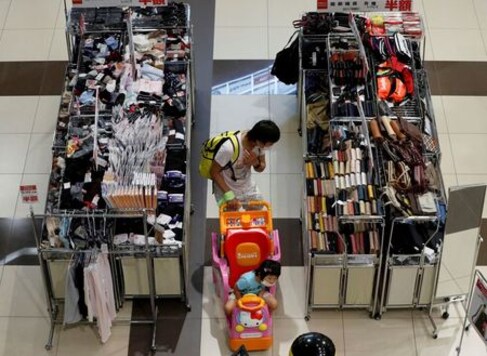 Japan's wholesale price fall eases further as economy emerges from coronavirus jolt