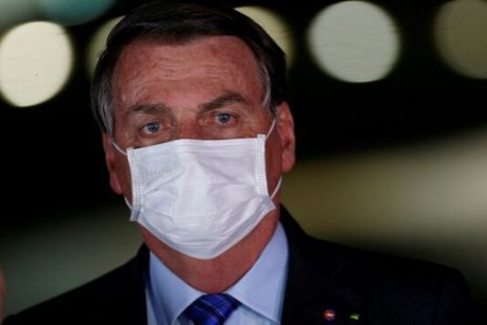 Nearly half of Brazilians say Bolsonaro not to blame for coronavirus death toll, poll says