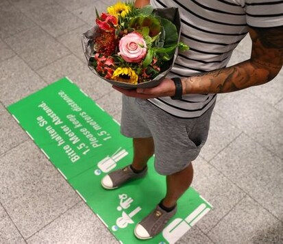 German-Brazilian couple hug again after coronavirus separation