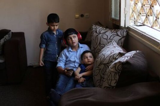 Gaza rapper, 11, strikes chord with rhymes about war and hardship