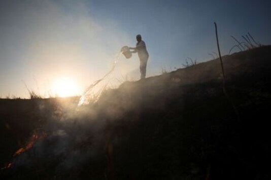 Dousing The Flames: Israel Battles Gaza Fire Balloon Blazes