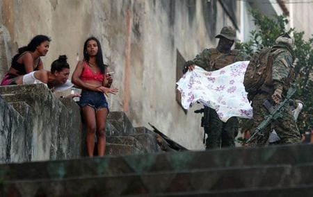 A Picture And Its Story: The Despair Of A Rio Widow, In A City Struggling With Violence