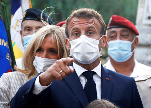 France weighs mask mandate at work as virus reawakens