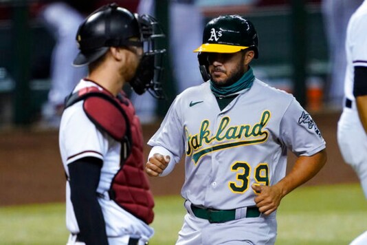 Peralta's 9th-inning single lifts D-backs past Athletics 4-3
