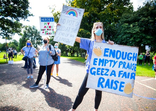 UK medics protest, seeking pay raise after pandemic struggle