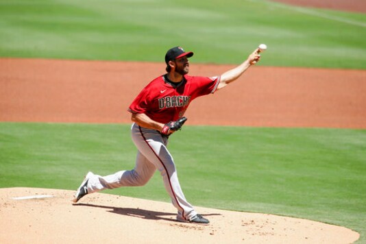 Arizona places Bumgarner on injured list with back strain