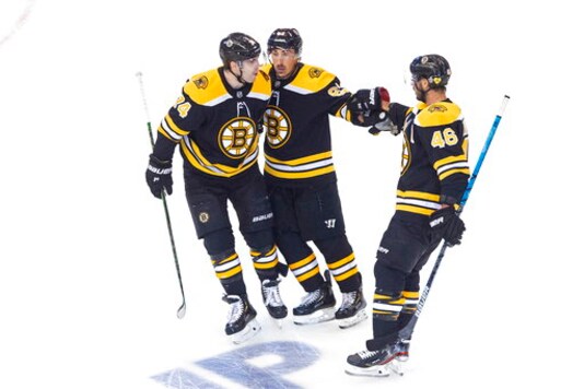 Hamilton helps Carolina beat Boston 3-2, tie series 1-1