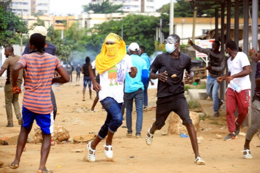 Opposition marches against Ivory Coast president's candidacy