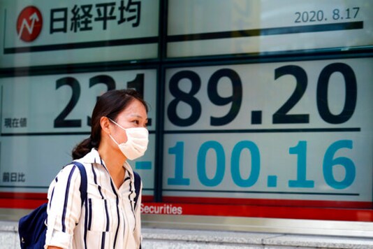 Japan stocks fall after economy contracts, other markets up