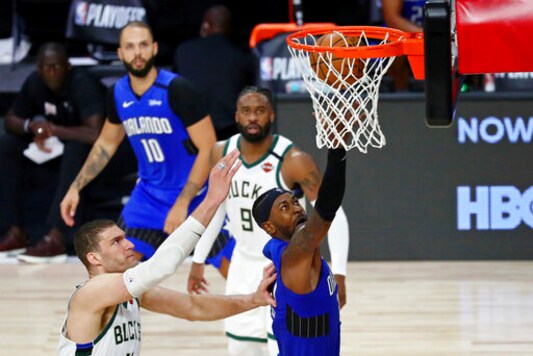 Vucevic, Magic upset top-seeded Bucks in Game 1, 122-110