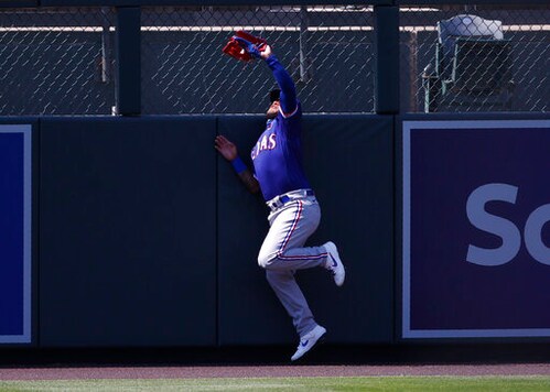 Rangers Place SS Andrus (back), OF Calhoun (hamstring) On IL