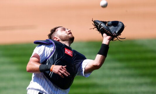 Gray strikes out 7 as Rockies beat Rangers 10-6