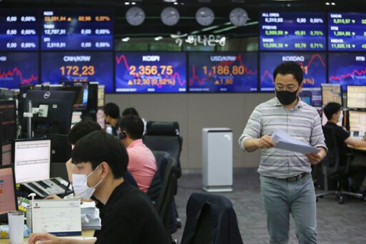 Markets Mixed After Fed Chair Says Low Rates To Persist